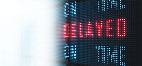 Departure board showing delays